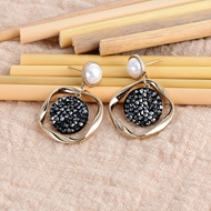 Show details for Unusual Casual Swarovski Element Dangle Earrings Show details for Unusual Casual Swarovski Element Dangle Earrings