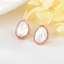 Show details for Classic White Stud Earrings from Reliable Manufacturer