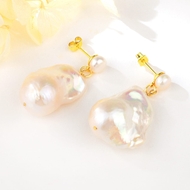 Show details for Shop Gold Plated Artificial Pearl Dangle Earrings with Wow Elements Show details for Shop Gold Plated Artificial Pearl Dangle Earrings with Wow Elements